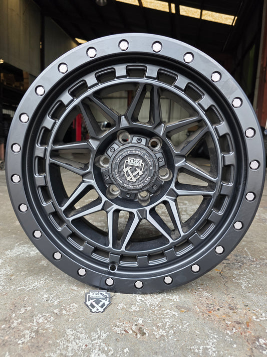 TKX 17X8.5 6X139.7 -12 OFFSET BLACK WITH SATIN BLACK T802EM