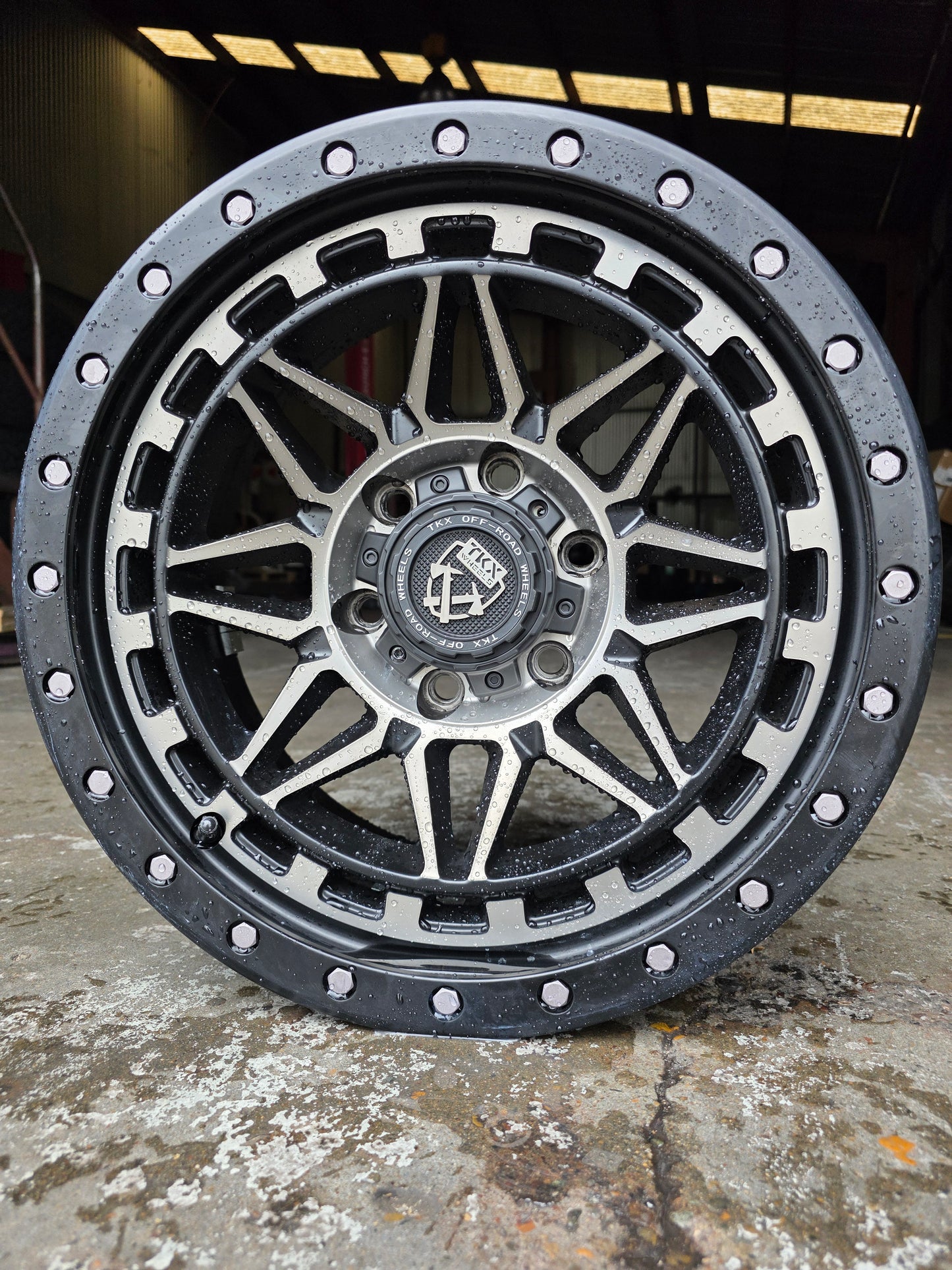 TKX 17X8.5 6X139.7 -25 OFFSET BLACK WITH MACHINE FACE T802CM