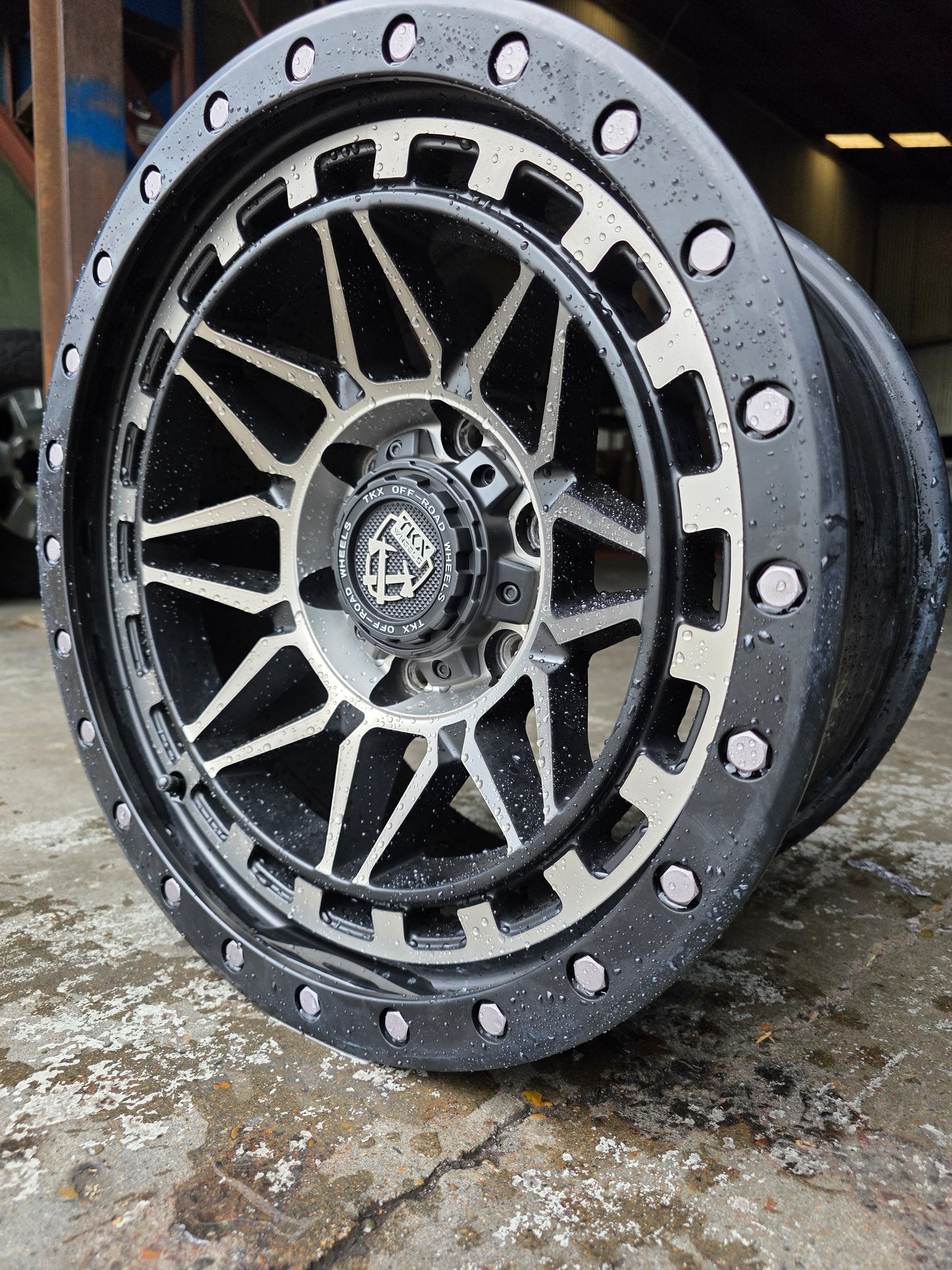 TKX 17X8.5 6X139.7 -25 OFFSET BLACK WITH MACHINE FACE T802CM